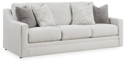 Ashley Furniture Maitelynn sofa in a stylish angled view, showcasing plush cushions and modern design.