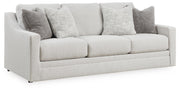 Ashley Furniture Maitelynn upholstery package with living room set, including sofa and loveseat, shown in a stylish fabric finish.