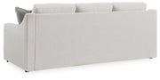 Ashley Furniture Maitelynn sofa with plush fabric and cushioned backrest, shown from the rear view.