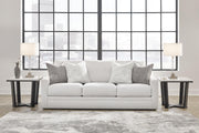 Ashley Furniture Maitelynn sofa with plush fabric and modern design, featuring cushioned seating and stylish armrests.