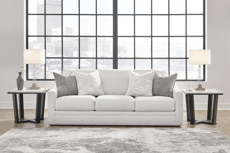 Ashley Furniture Maitelynn upholstery living room set with sofa and chairs, featuring plush cushions and neutral fabric.