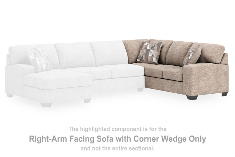 Ashley Furniture Newellen Sleeper Sectional with Chaise, fabric upholstery, featuring a spacious chaise lounge and sleeping sofa.