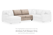 Ashley Furniture Newellen sleeper sectional with chaise, showing plush upholstery and modern design in a living room setting.