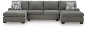Ashley Furniture Clarington sectional with double chaise, featuring plush cushions and modern design in a spacious living room setting.