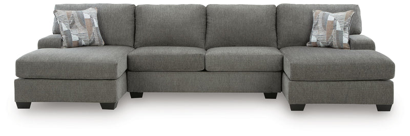 Ashley Furniture Clarington sectional with double chaise, featuring plush cushions and modern design in a spacious living room setting.