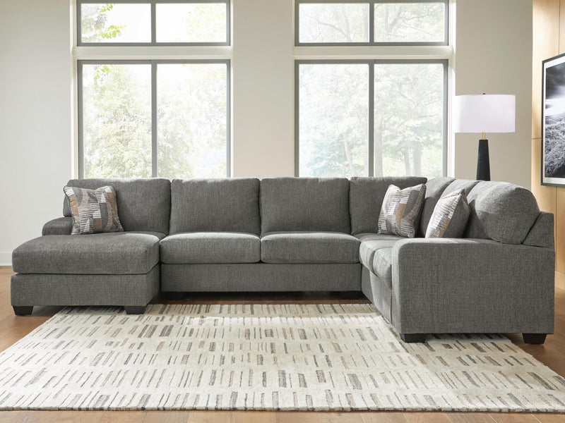Ashley Furniture Clarington sectional with chaise, featuring plush fabric, modern design, and ample seating in a contemporary living room.