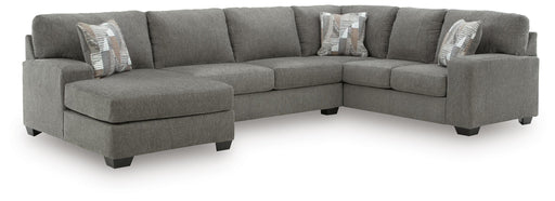 Ashley Furniture Clarington sectional with chaise, featuring plush fabric upholstery and modern design in a spacious living room setting.