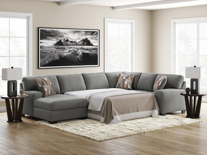 Ashley Furniture Clarington Sleeper Sectional with Chaise showing plush fabric, sectional design, and attached chaise lounge.