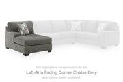 Ashley Furniture Clarington sectional with double chaise, featuring plush cushions and a modern design in a spacious living room setting.