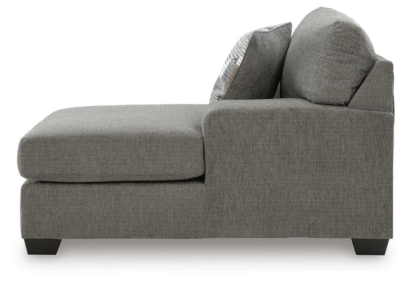 Ashley Furniture Clarington sectional with double chaise, featuring plush upholstery and modern design in a spacious living room setting.