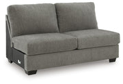Ashley Furniture Clarington sectional with double chaise, featuring plush cushions and modern design, shown from an angled view.