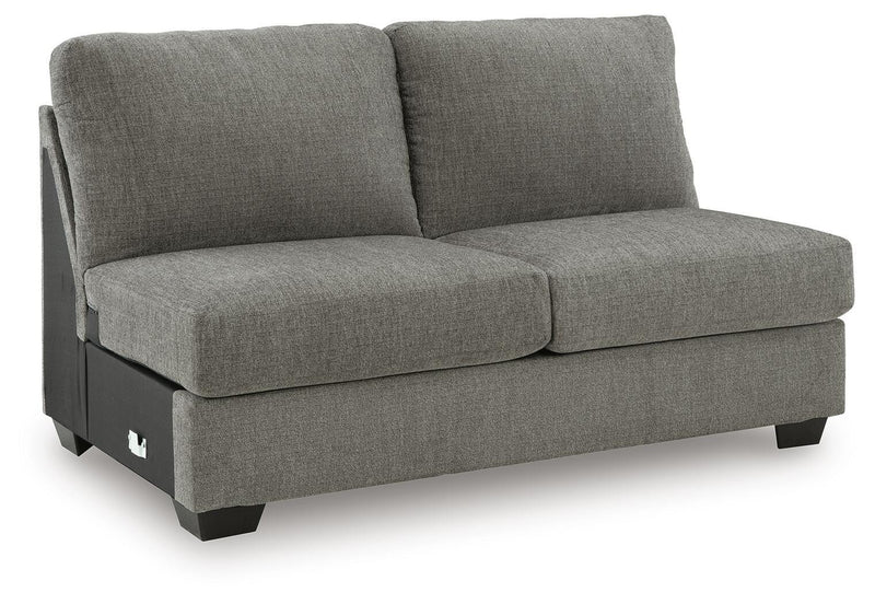 Ashley Furniture Clarington sectional with double chaise, featuring plush cushions and modern design, shown from an angled view.