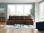 Ashley Furniture McDowlan sectional with double chaise, showcasing plush upholstery and modern design in a spacious living room setup.