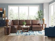Ashley Furniture McDowlan sectional with chaise, tan upholstered fabric, featuring plush cushions and modern design.