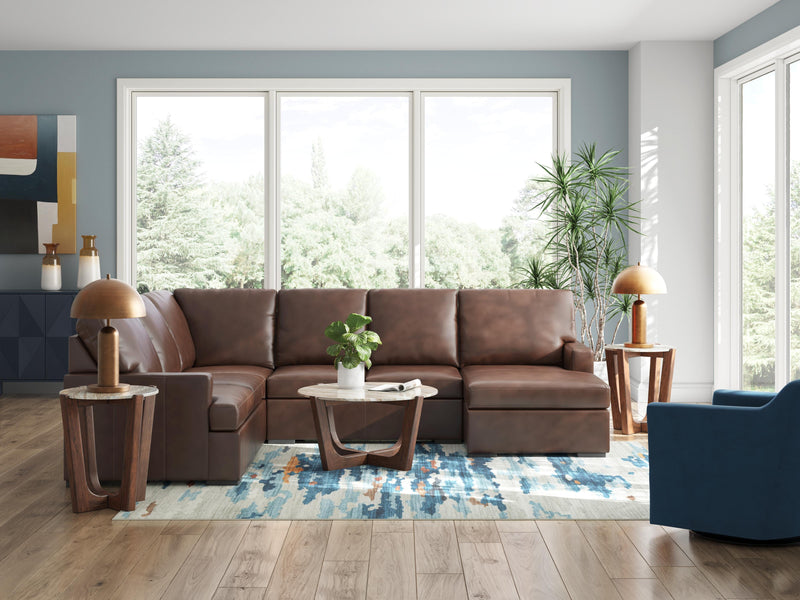 Ashley Furniture McDowlan sectional with chaise, tan upholstered fabric, featuring plush cushions and modern design.