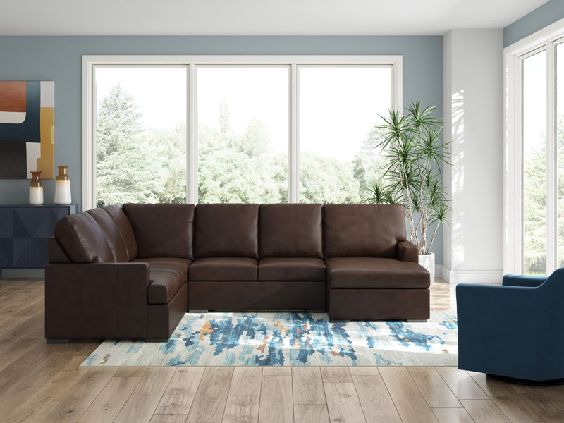 Ashley Furniture McDowlan sectional with chaise, featuring plush fabric and modern design, shown in a spacious living room setting.