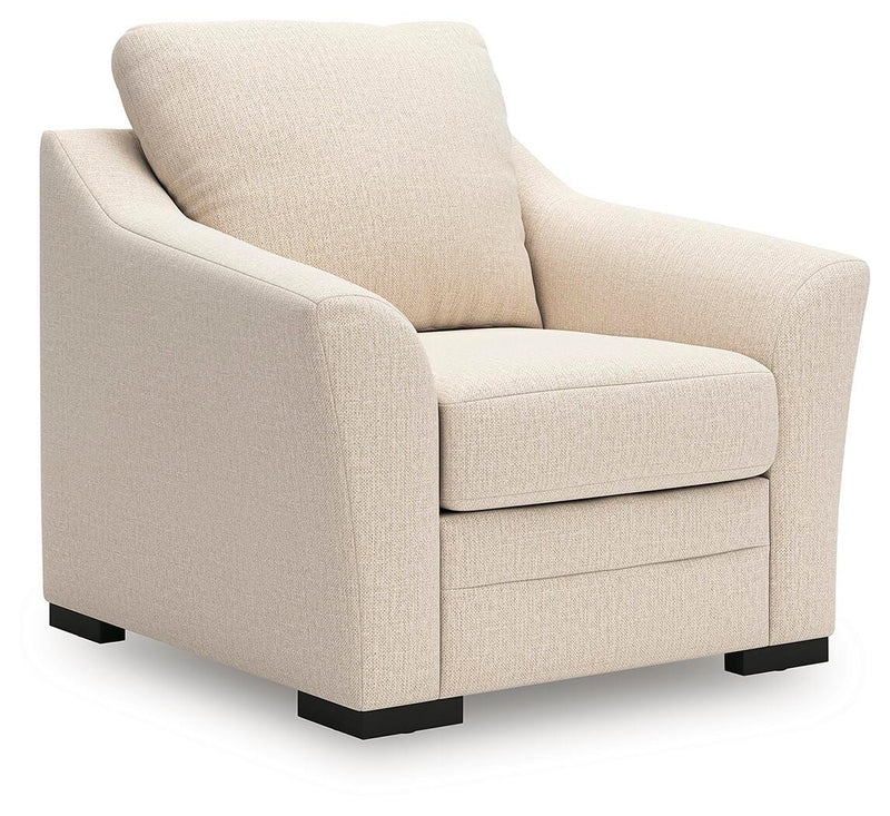 Ashley Furniture Lango living room set with sofa and armchair, featuring modern upholstery and stylish design.
