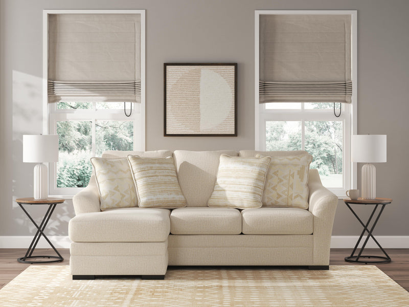 Ashley Furniture Lango sofa chaise sleeper with plush fabric and modern design, featuring a comfortable sleeping area and stylish look.