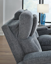 Ashley Furniture Studio Cave living room set with sofa and armchair, featuring modern design and neutral upholstery.