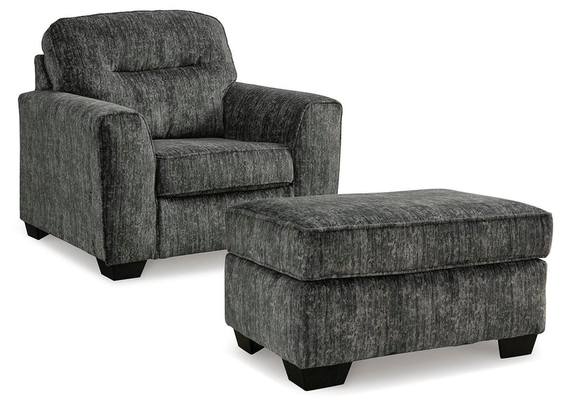Ashley Furniture Lonoke living room set with sofa and armchair, featuring neutral fabric upholstery and modern design.