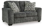 Ashley Furniture Lonoke living room set with a sofa and loveseat arranged in a stylish, comfortable living space.