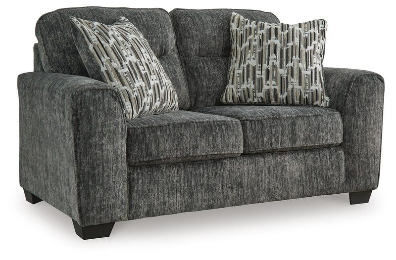 Ashley Furniture Lonoke living room set with a sofa and loveseat arranged in a stylish, comfortable living space.