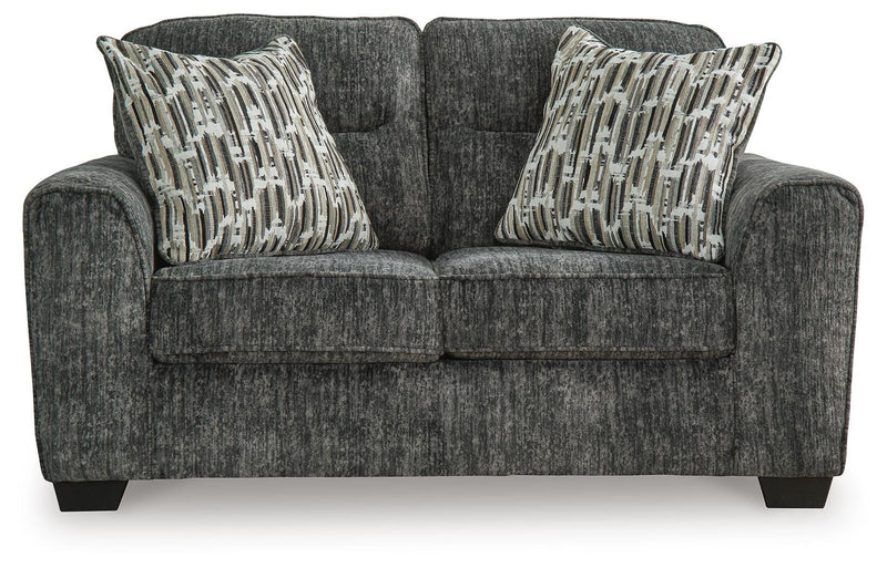 Ashley Furniture Lonoke living room set with sofa and armchair, featuring neutral upholstery and modern design.