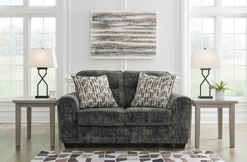 Ashley Furniture Lonoke living room set with sofa, loveseat, and armchair in a modern fabric design.