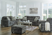 Ashley Furniture Lonoke living room set featuring a sofa and armchair with plush upholstery and modern design.