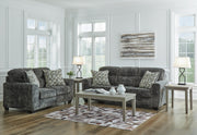 Ashley Furniture Lonoke living room set featuring a sofa and armchair with neutral upholstery and modern design.
