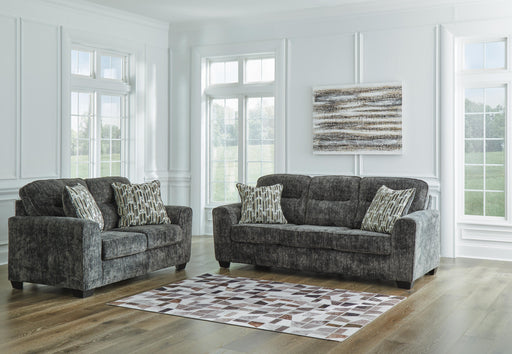 Ashley Furniture Lonoke living room set featuring a sofa and loveseat with neutral fabric and modern design.
