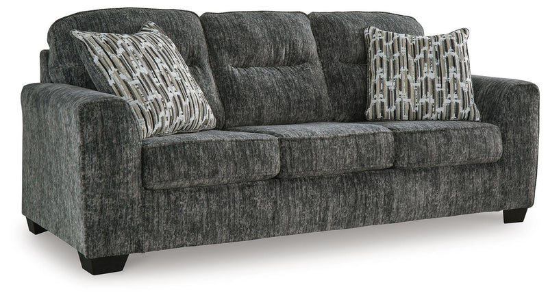 Ashley Furniture Lonoke living room set with sofa and loveseat, shown from an angled side view in a modern home setting.