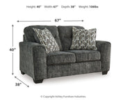Ashley Furniture Lonoke living room set with sofa and loveseat, featuring neutral upholstery and wooden legs.