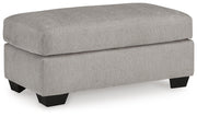 Ashley Furniture Avenal Park living room set with sofa and armchair, featuring neutral upholstery and modern design.