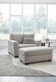 Ashley Furniture Avenal Park living room set with plush sofa and armchair, featuring neutral upholstery and wooden accents.