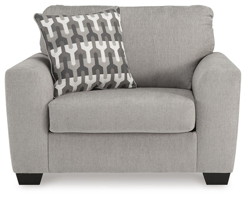 Ashley Furniture Avenal Park living room set with a sofa and loveseat, featuring plush cushions and neutral upholstery.