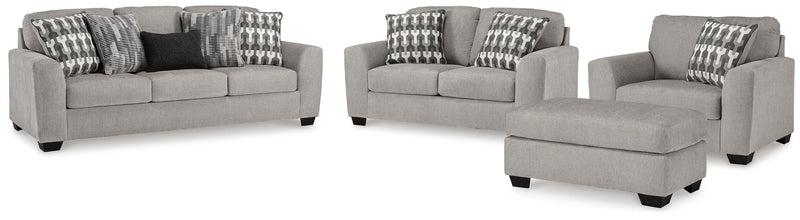 Ashley Furniture Avenal Park living room set featuring a sofa, loveseat, and armchair with neutral upholstery and wooden legs.