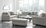 Ashley Furniture Avenal Park living room set with a sofa and armchair, featuring plush cushions and wooden legs.