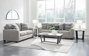 Ashley Furniture Avenal Park living room set with sofa and armchair in a cozy, modern design, shown in a stylish living space.