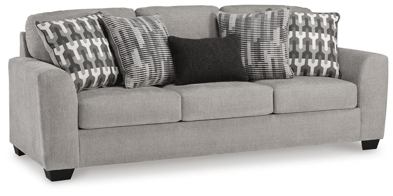 Ashley Furniture Avenal Park sofa shown from an angle with plush cushions and a modern design in a cozy living room setting.