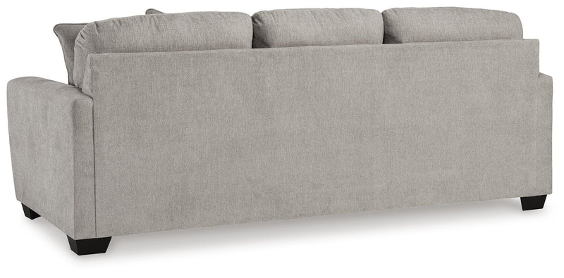 Ashley Furniture Avenal Park living room set with sofa and armchair, featuring neutral upholstery and modern design.