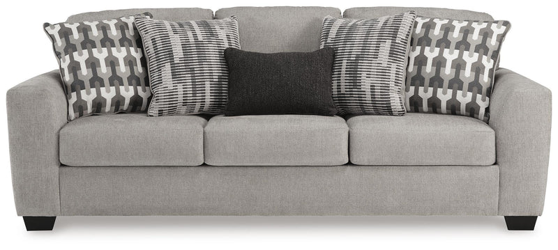 Ashley Furniture Avenal Park living room set featuring a sofa and loveseat with neutral upholstery and modern design.