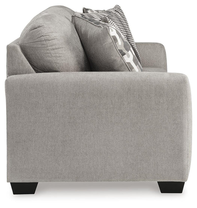 Ashley Furniture Avenal Park sofa with plush cushions and neutral upholstery, showing a side view of the modern living room sofa.
