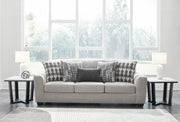 Ashley Furniture Avenal Park sofa with plush cushions and neutral fabric, shown in a modern living room setting.