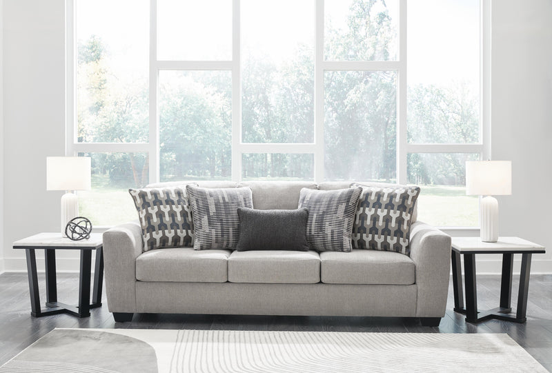 Ashley Furniture Avenal Park sofa with plush cushions and neutral fabric, shown in a modern living room setting.