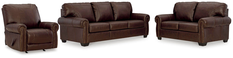 Ashley Furniture Colleton living room set with sofa and loveseat featuring plush cushions and neutral upholstery.