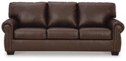 Ashley Furniture Colleton living room set featuring a sofa and loveseat with plush cushions and neutral fabric upholstery.