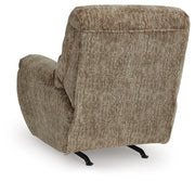 Ashley Furniture Stayfish recliner with plush cushions and wood accents, showing the back and side view of the comfortable recliner.