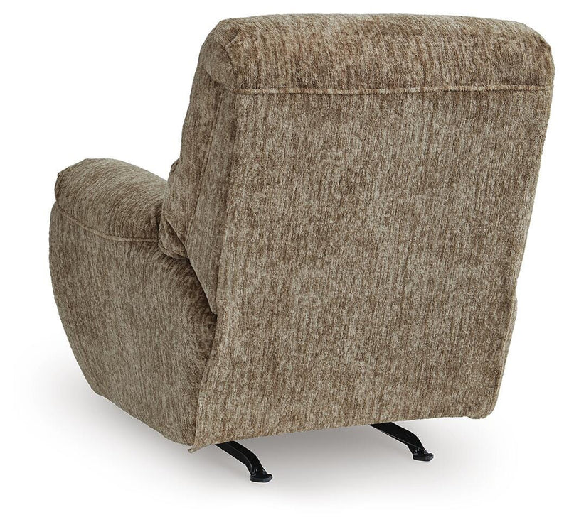 Ashley Furniture Stayfish recliner with plush cushions and wood accents, showing the back and side view of the comfortable recliner.