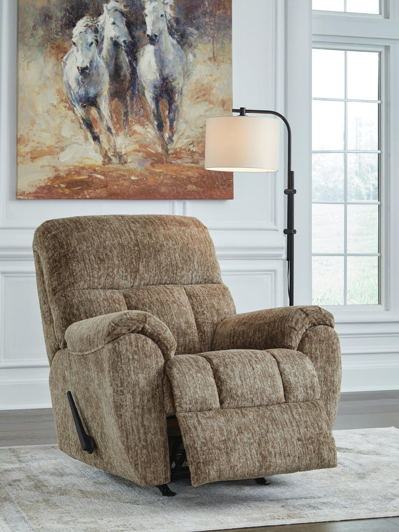 Open Ashley Furniture Stayfish Recliner showing plush cushions and wooden legs, perfect for comfortable living room seating.